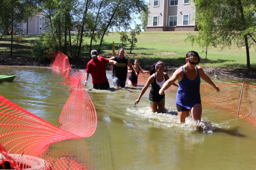 Participants run the Howler