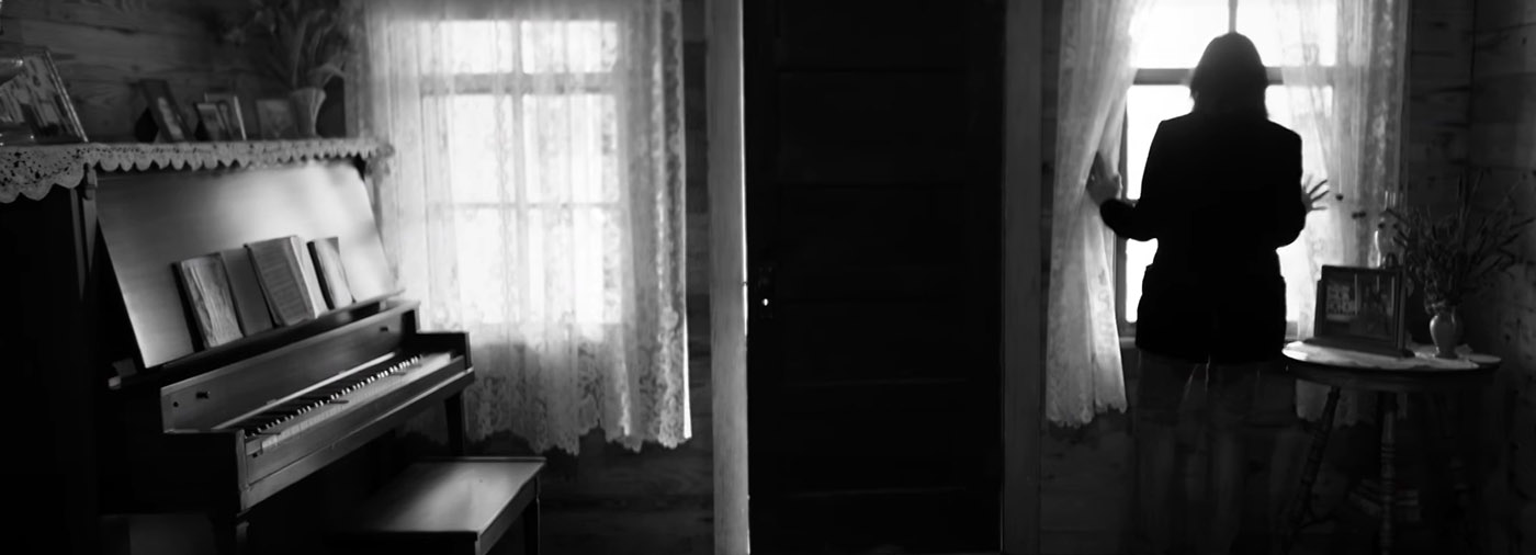 Rosanne and Piano.jpg