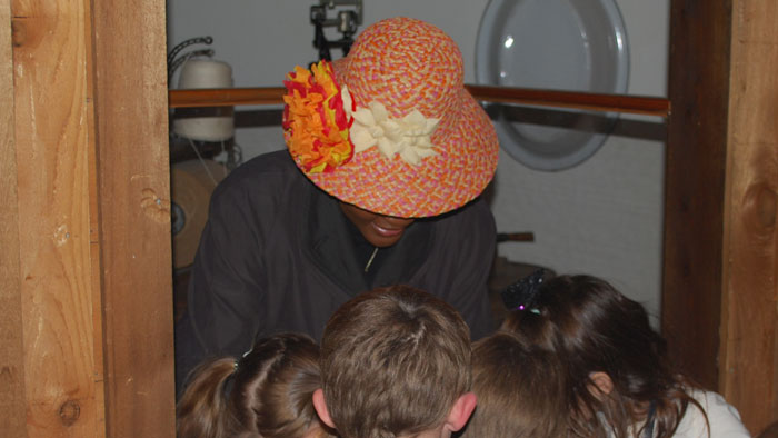 Children participate in Día de los Muertos event.