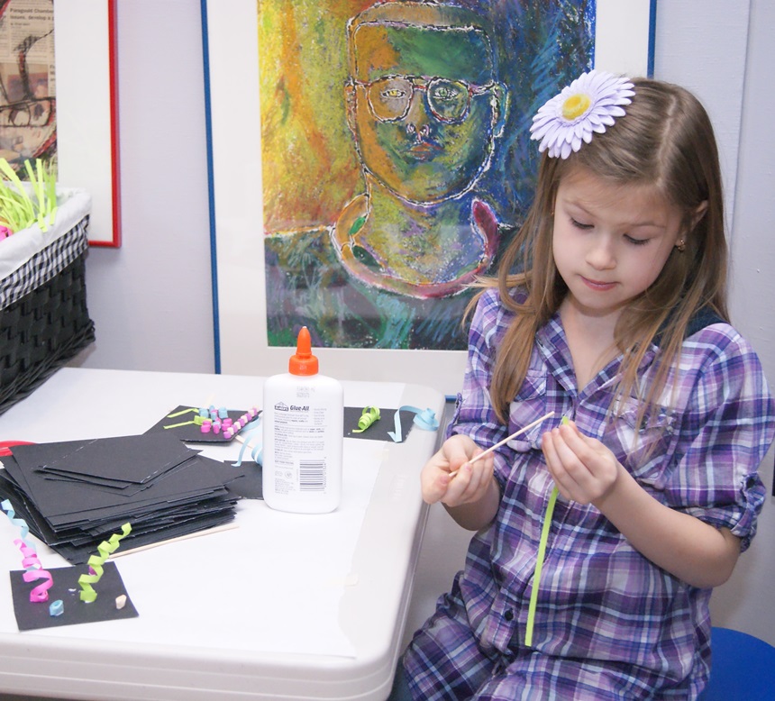 Young lady learns quilling