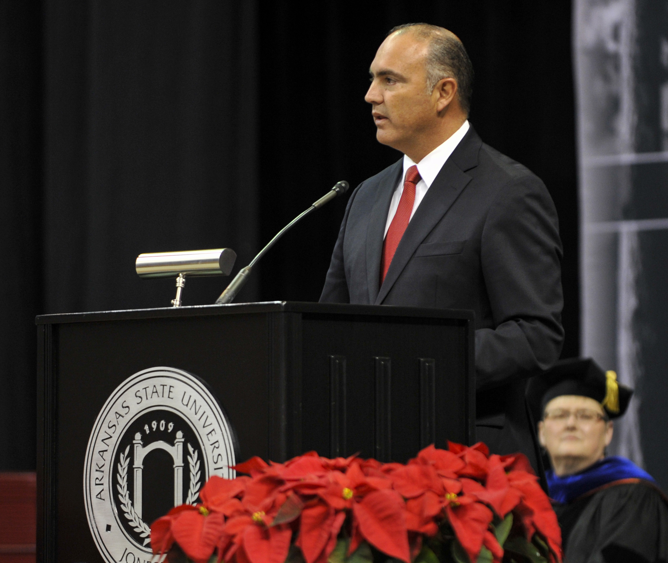 Calzada speaking at graduation