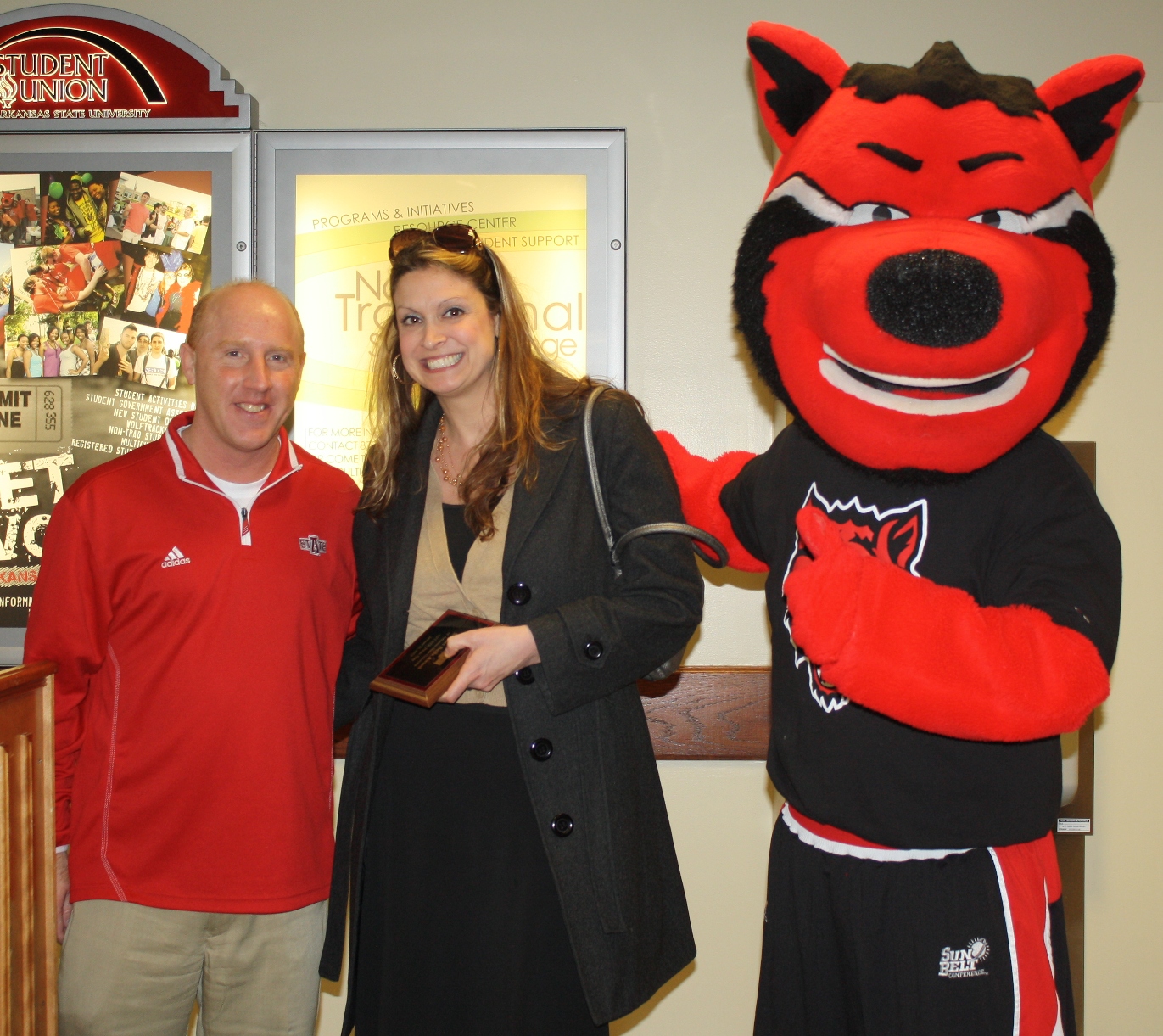 Darla Fletcher, with Coach Brian Boyer and Howl